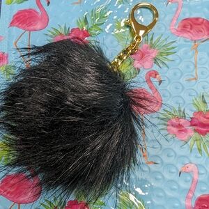 Joy Mangano. Key chain. Fur pom pom. Black with a gorgeous gold chain.